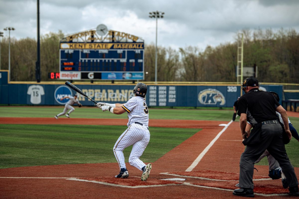 Kent graduate student Hayden Jatczak hits a double down the right field line in the bottom of the first against Akron on Friday, April 25, 2025. 