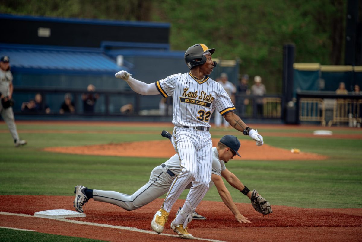 Kent freshman Micah Rienstra-Kiracofe fails to beat the throw from the short stop and the umpire calls him out at first in the bottom of the second on Friday, April 25, 2025.