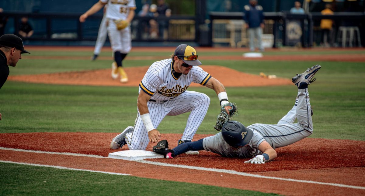 Kent pitcher Gavin Jones throws to senior Hunter Klotz and successfully picks off Akron sophomore Austin Lafferty in the top of the fourth on Friday, April 25, 2025.