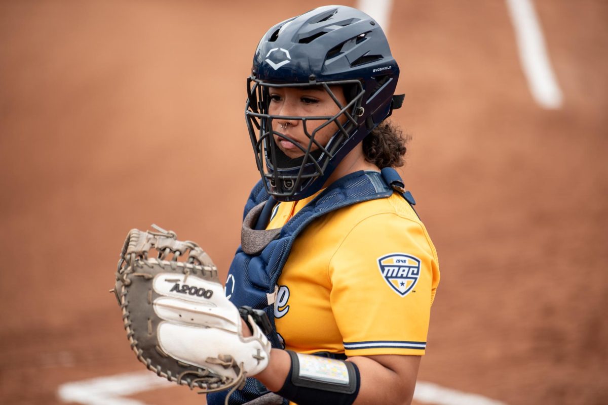 Kent sophomore Leilani Johnson prepares to catch a softball during warmups on Saturday, April 5, 2025. 
