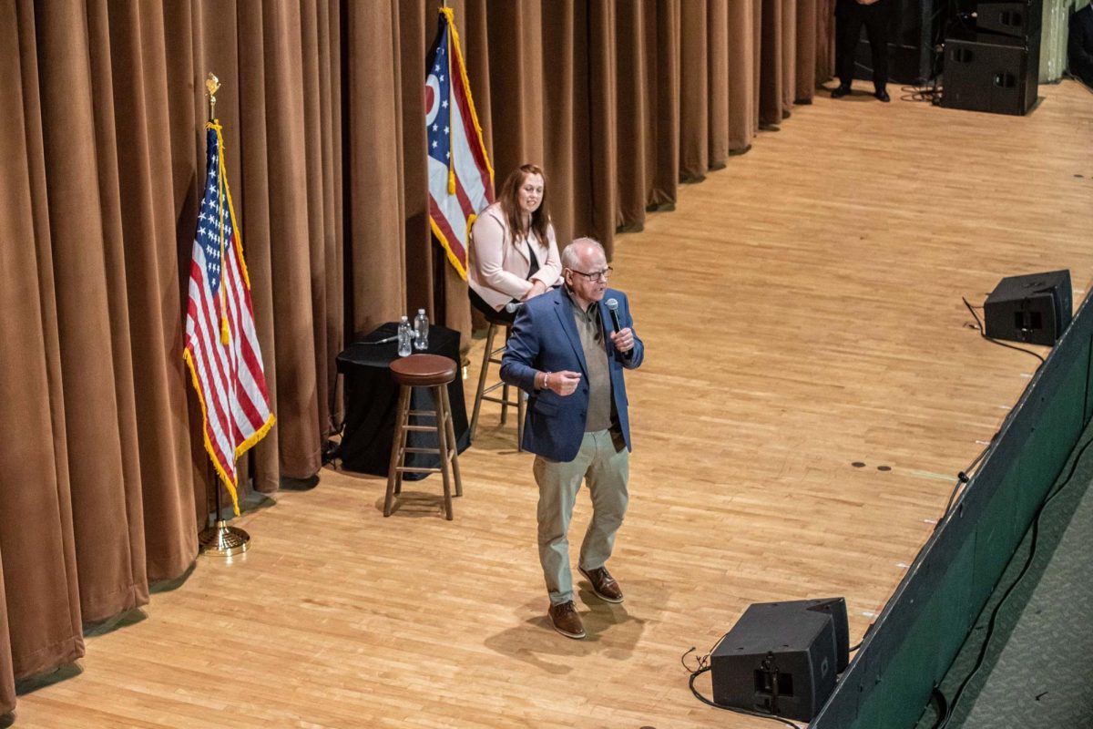 Tim Walz speaks to a crowd of around 2,100 with 500 people in the overflow room on Monday, April 7, 2025.
