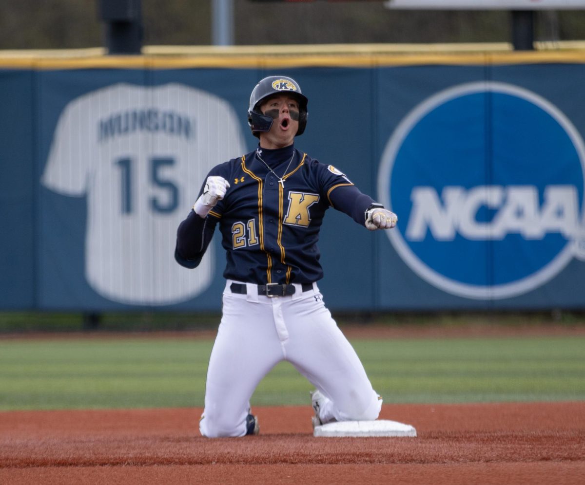 Kent senior Jake Casey celebrates after getting to second base in the bottom of the sixth in their game against Akron on Saturday, April 26, 2025. He later made it to home plate in the next play and made the score five to three.