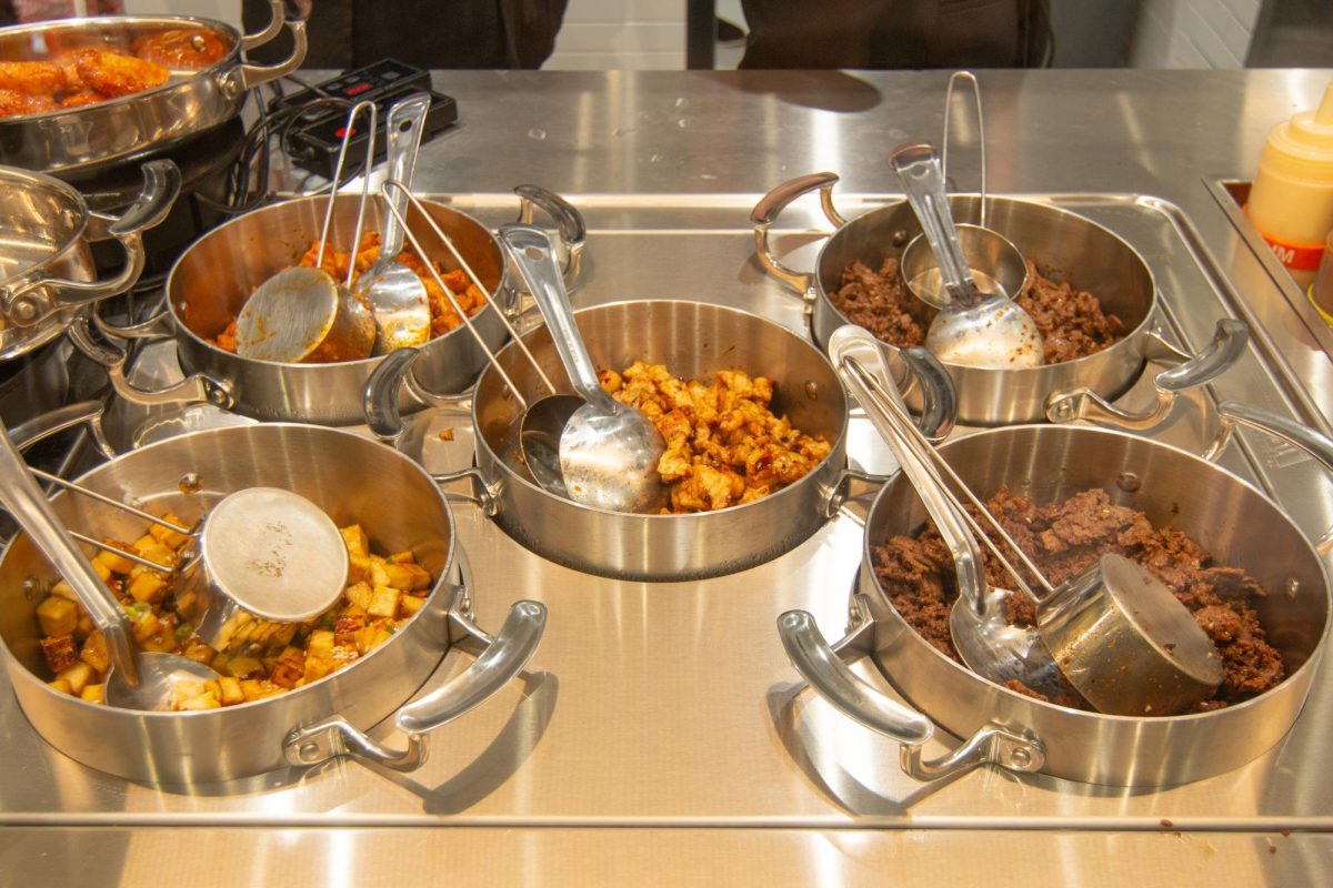 Protein options sit on display at Bibi Bop Opening on May 22, 2025.
