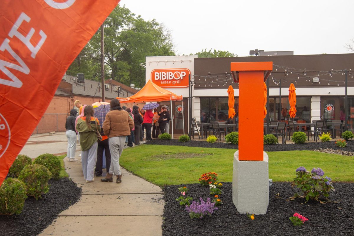 Kent citizens stand for Bibi Bop Grand Opening on May 22, 2025.