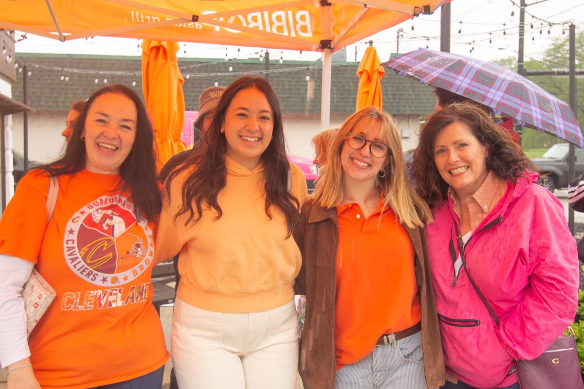 Cathy Leonardo, Tawny Leonardo(KSU Student), Kate Cihlar(KSU Student), and Jen Cihlar(KSU Alumni) await Bibi Bop Grand Opening on May 22, 2025.