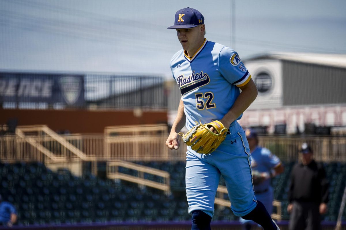 Redshirt sophomore pitcher Gavin Jones runs toward the pitching mound.