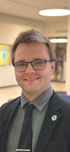 Dr. Joseph Oglio, the eighth youngest person to receive a doctorate from Kent State University.