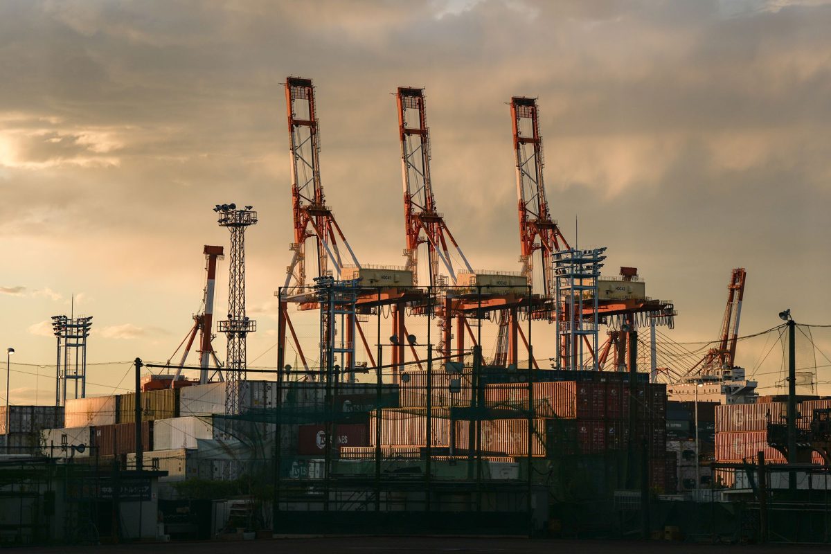 Containers under gantry cranes at a shipping terminal in Yokohama, Japan, on April 15.