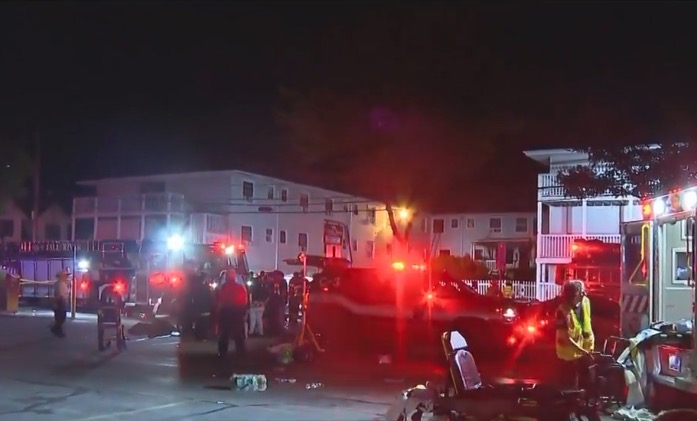 Flames broke out around 9:30 p.m. Sunday at the Gabriel House on Oliver Street. When firefighters arrived, they found heavy flames coming through the main entrance and several people hanging out of the windows, waiting to be rescued, according to Fall River Fire Chief Jeffrey Bacon.