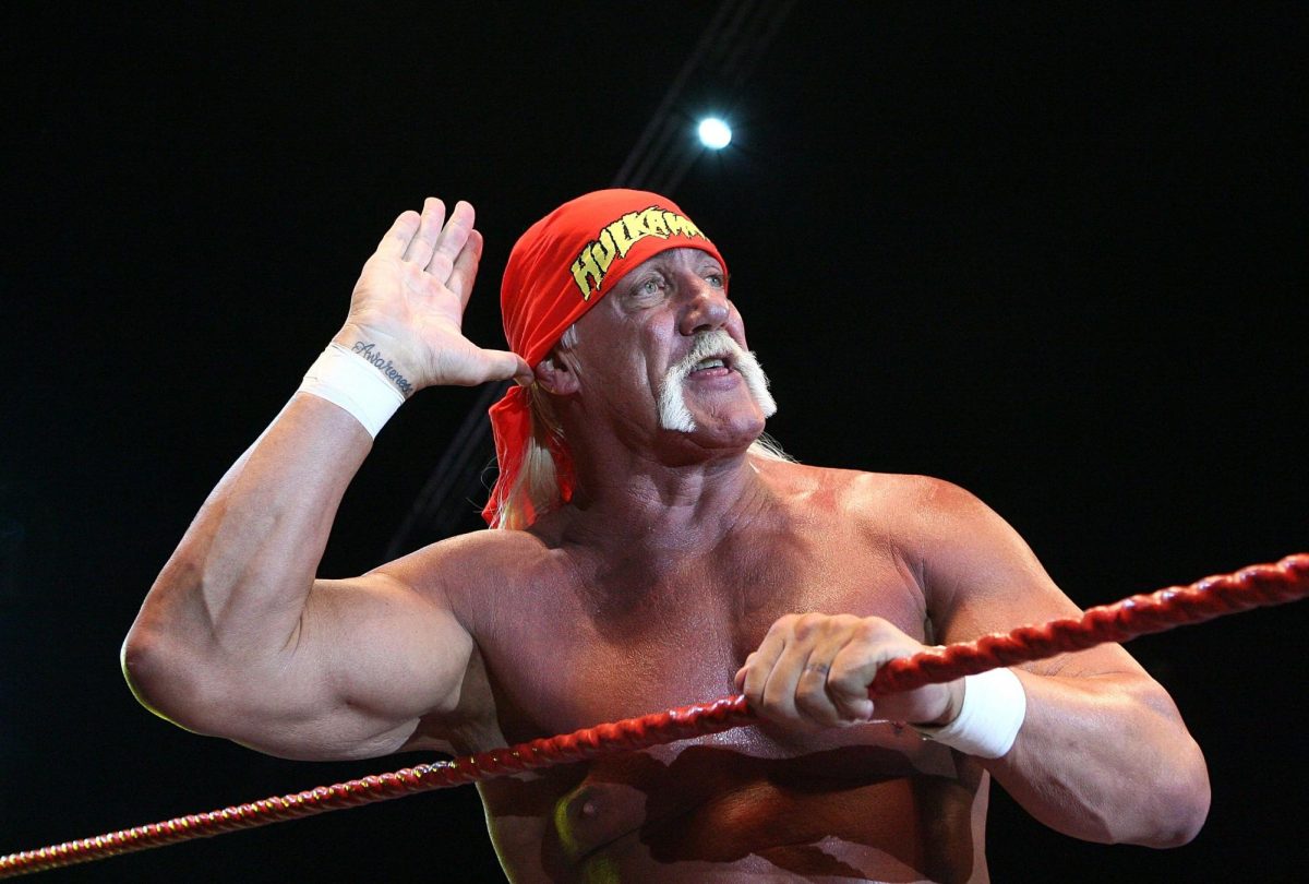 Hulk Hogan gestures to the audience during his Hulkamania Tour in 2009.