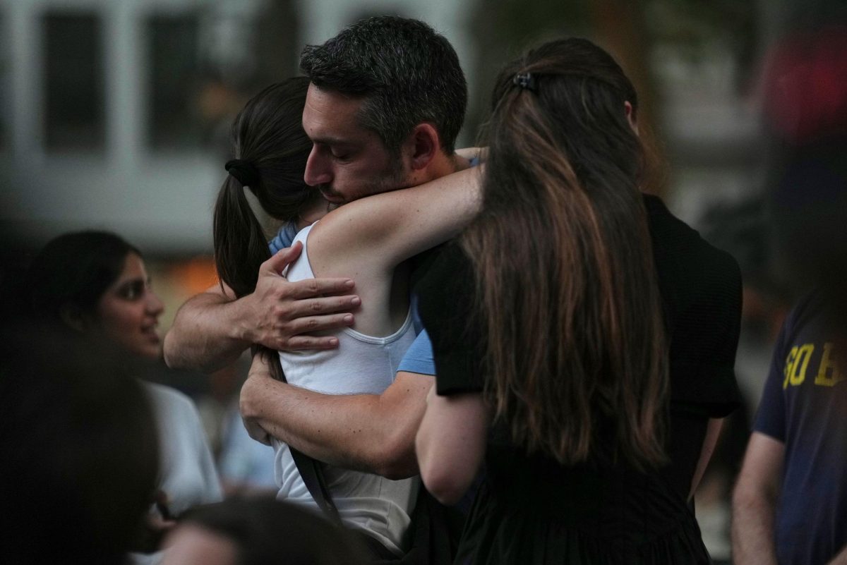 Community members gathered in New York City to honor the victims of the shooting on July 29 evening.