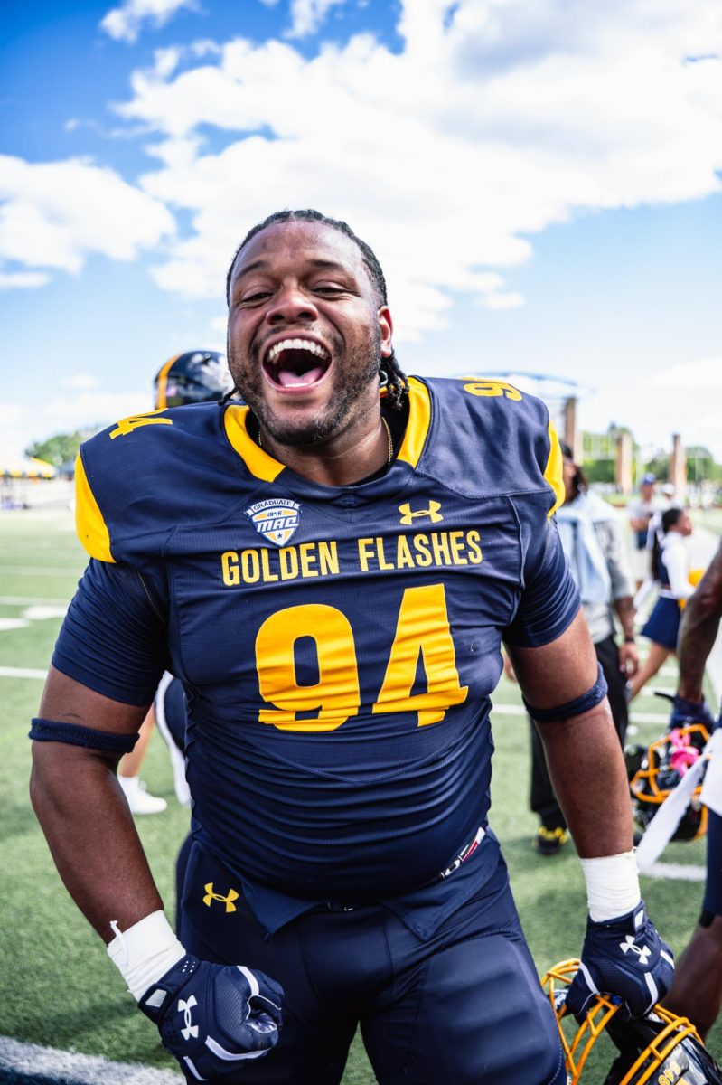 Kent graduate student Amon Williams cheers after their win against Merrimack on Aug. 30, 2025.