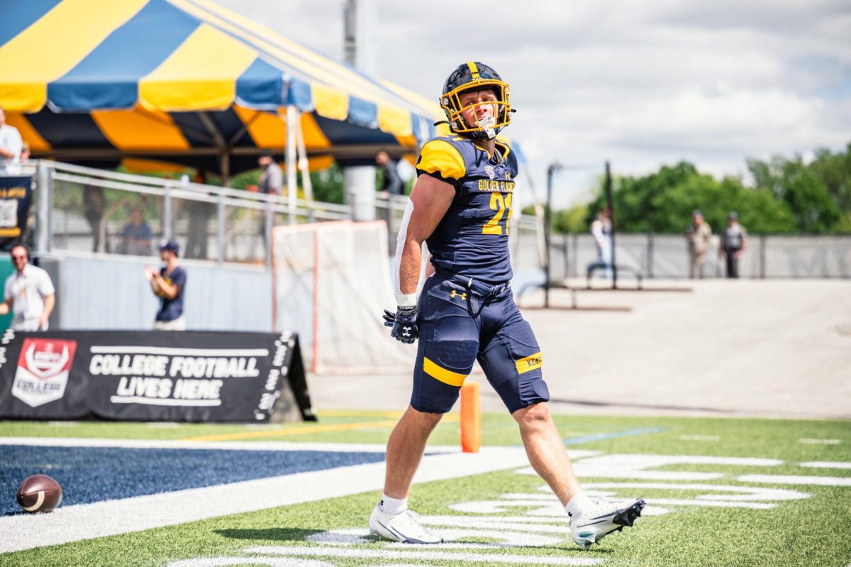 Kent redshirt freshman Cade Wolford walks off the field after scoring a touchdown in the third quarter against Merrimack on Aug. 30, 2025. This made the score 14-3 with Kent in the lead.
