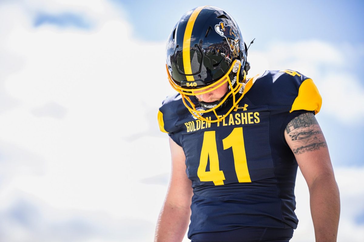 Kent graduate student Gus Goodell warms up before the games against Merrimack on Aug. 30, 2025.