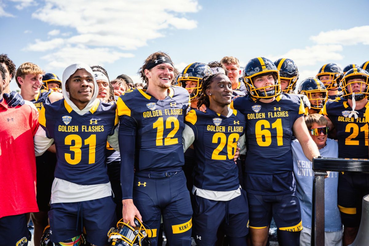 Kent football team smiles after their win against Merrimack on Aug. 30, 2025.