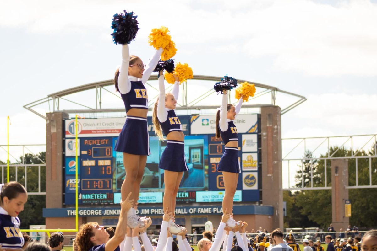 Kent State cheer team cheers towards the crowd at the home opener on Saturday, Aug. 30, 2025.