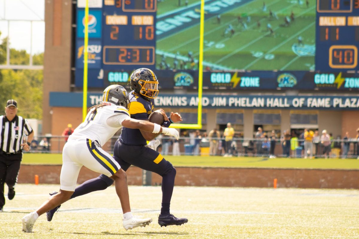 Quarterback, CJ Montes, 7, carries the ball down the field during the first quarter of the home opener on Saturday, Aug. 30, 2025.