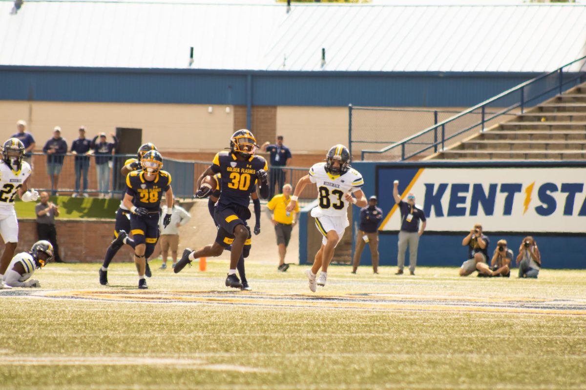 Wide Receiver Da’Realyst Clark, 30, rushes the ball down the field during the fourth quarter of the home opener on Saturday, Aug. 30, 2025 at Dix Stadium.