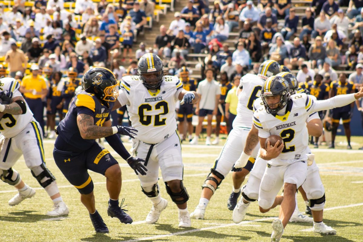 Defensive lineman, Antoine Campbell Jr., 11, defending against Merrimack player in the home opener at Dix Stadium on Saturday, Aug. 30, 2025. 