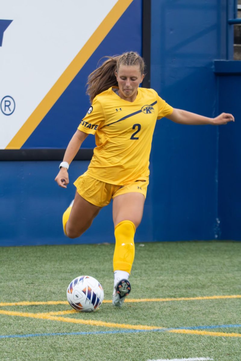 Kent junior midfielder, Samantha Miller, 2, kicks a corner kick to her team during the first half of their game against Youngstown State on Thursday, August 28th, 2025.