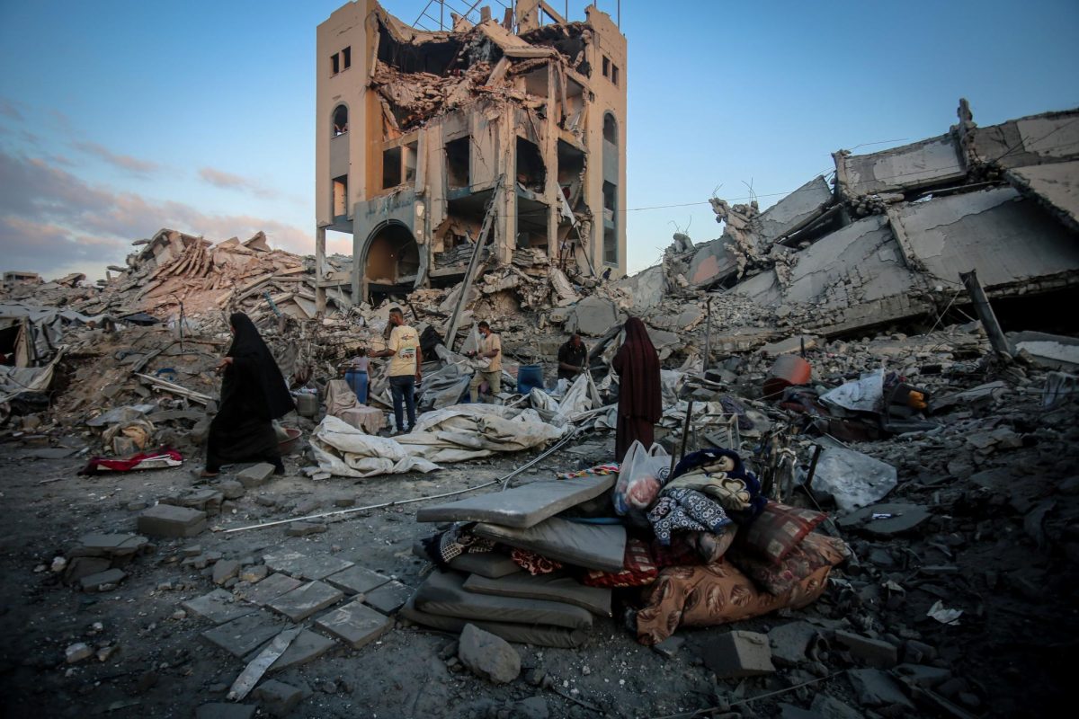 	Palestinians make their way through the aftermath of an Israeli strike in the Sheikh Ridwan neighborhood of Gaza City, Gaza on August 6, as Prime Minister Benjamin Netanyahu considers ordering the “conquest’ of the besieged territory.