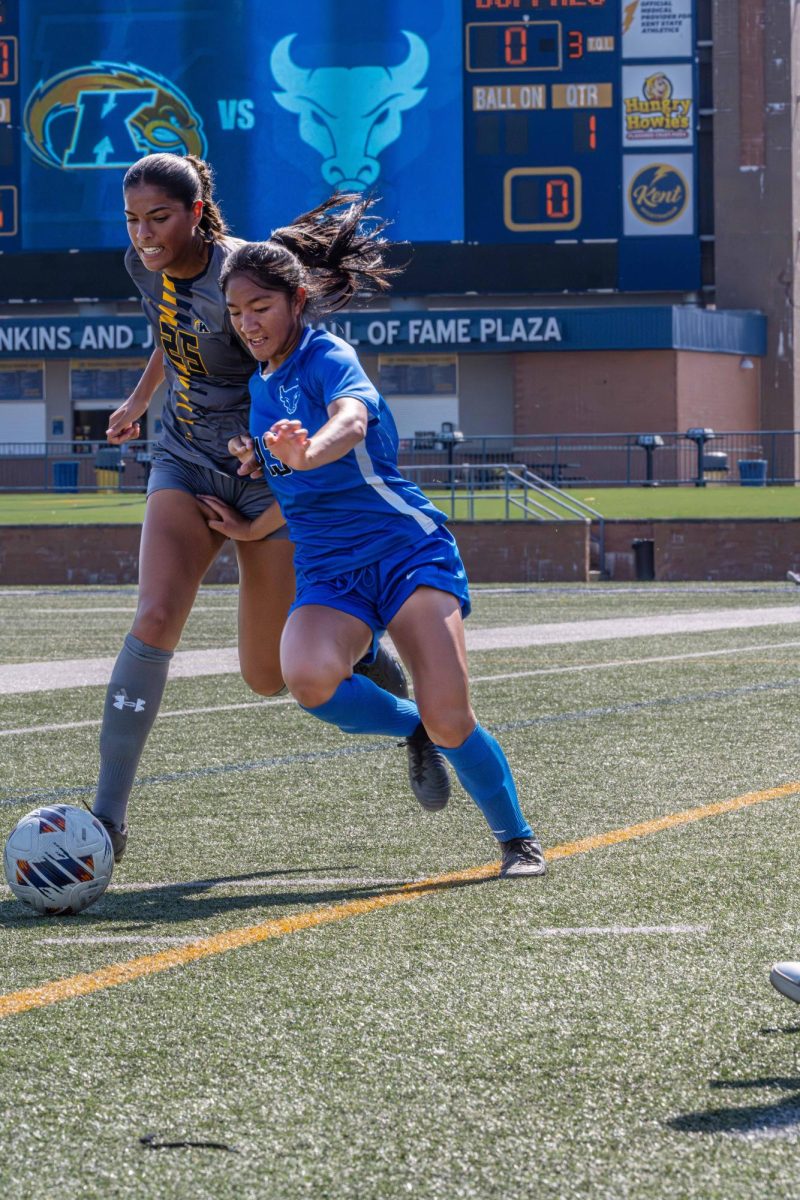 Josie Morgan, a junior, fights for the ball against Buffalo. 