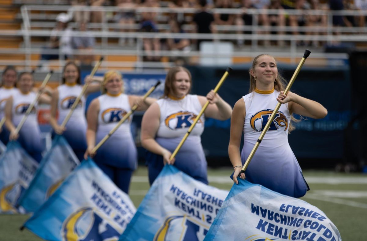 Kent State Marching Band Flag Corp stands during their James Bond halftime performance at the football game against University of Buffalo on Saturday, Sept 13, 2025.