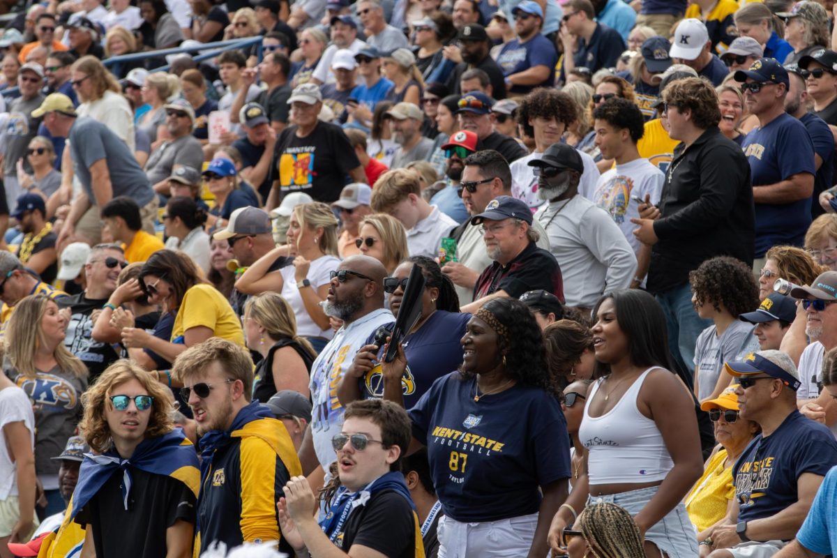 Attendees of the Kent vs. Buffalo game stand as they watch the third quarter of the game on Saturday, Sept 13, 2025. 