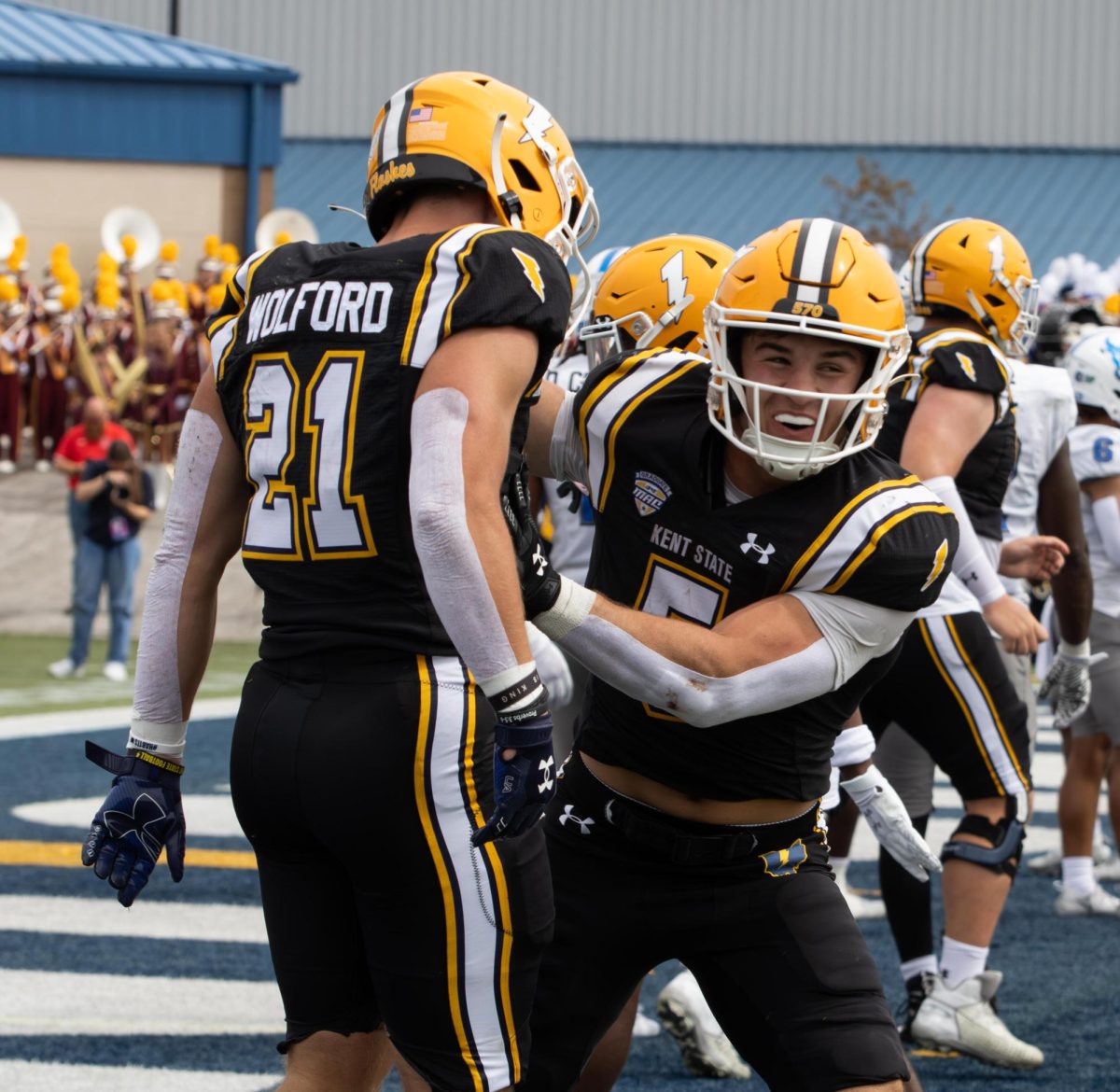 Kent redshirt junior and running back, Gavin Garcia, 5, pats 
redshirt freshman and wide receiver, Cade Wolford, 21, on the chest after scoring a touchdown during the second quarter of their game against University of Buffalo on Saturday, Sept 13, 2025.