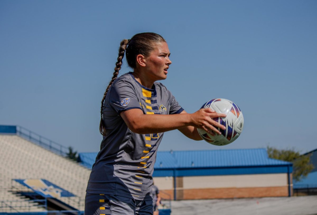 Kent Sophomore Ali Weibel prepares to throw the ball back into play during game against Buffalo on Sunday, Sept. 28, 2025.