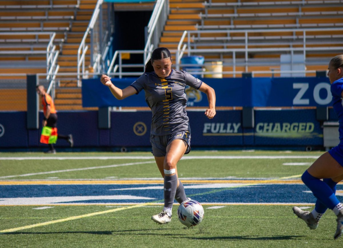 Kent sophomore Katie Henahan controls the play in midfield during the first half of the game against Buffalo on Sunday, Sept. 28, 2025.