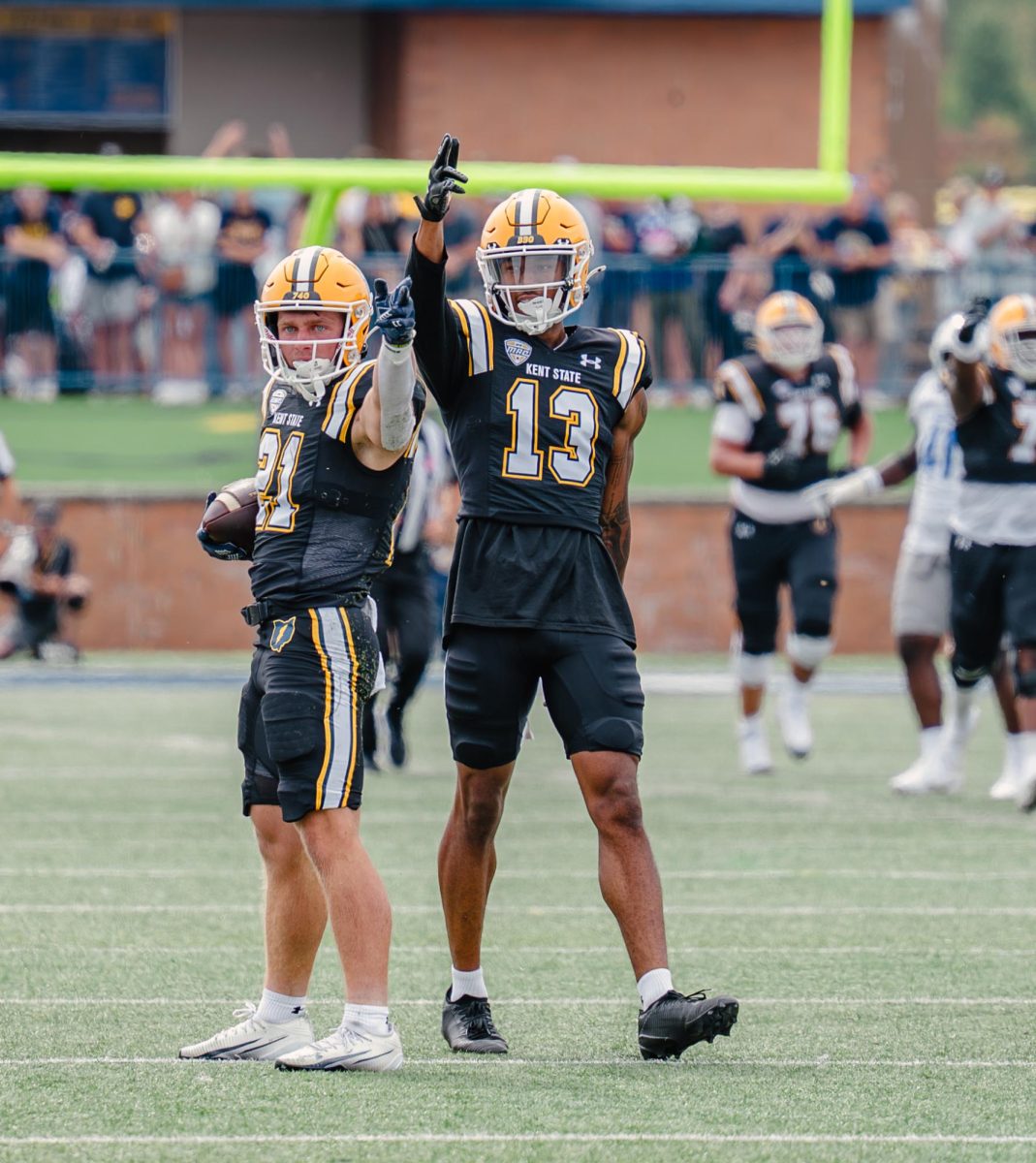 Kent redshirt freshman Cade Wolford, 21, and redshirt sophomore Ardell Banks celebrates a play in the second quarter on Sept. 13, 2025.