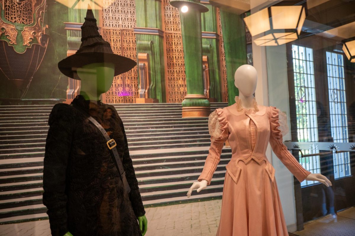 The original wicked outfits designed by Paul Tazewell sit in the display case located in the Kent museum located at 515 Hilltop Drive on Sept. 18, 2025.