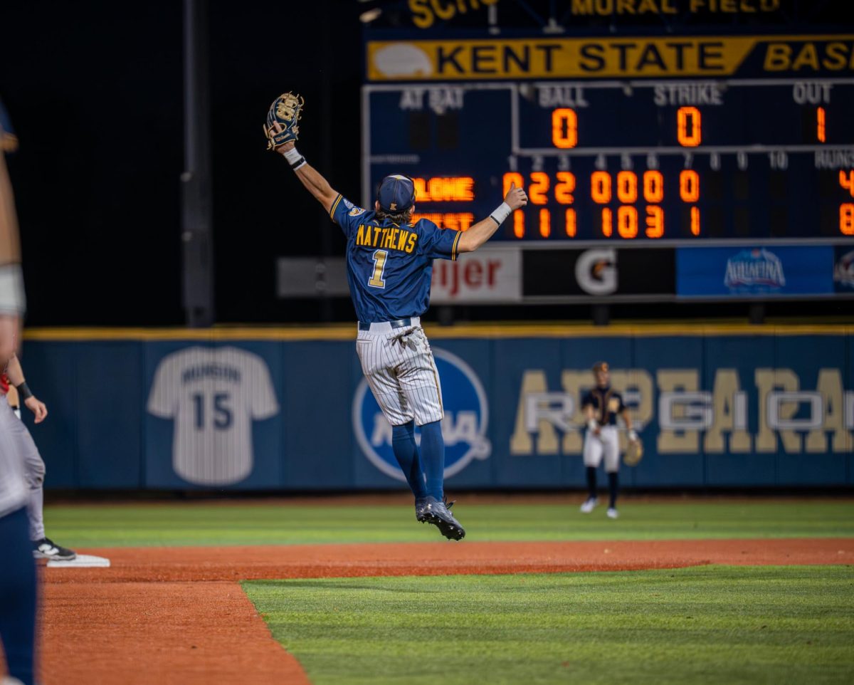 Kent senior Luke Matthews leaps to make a catch in their game against Malone on Sept. 26, 2025.