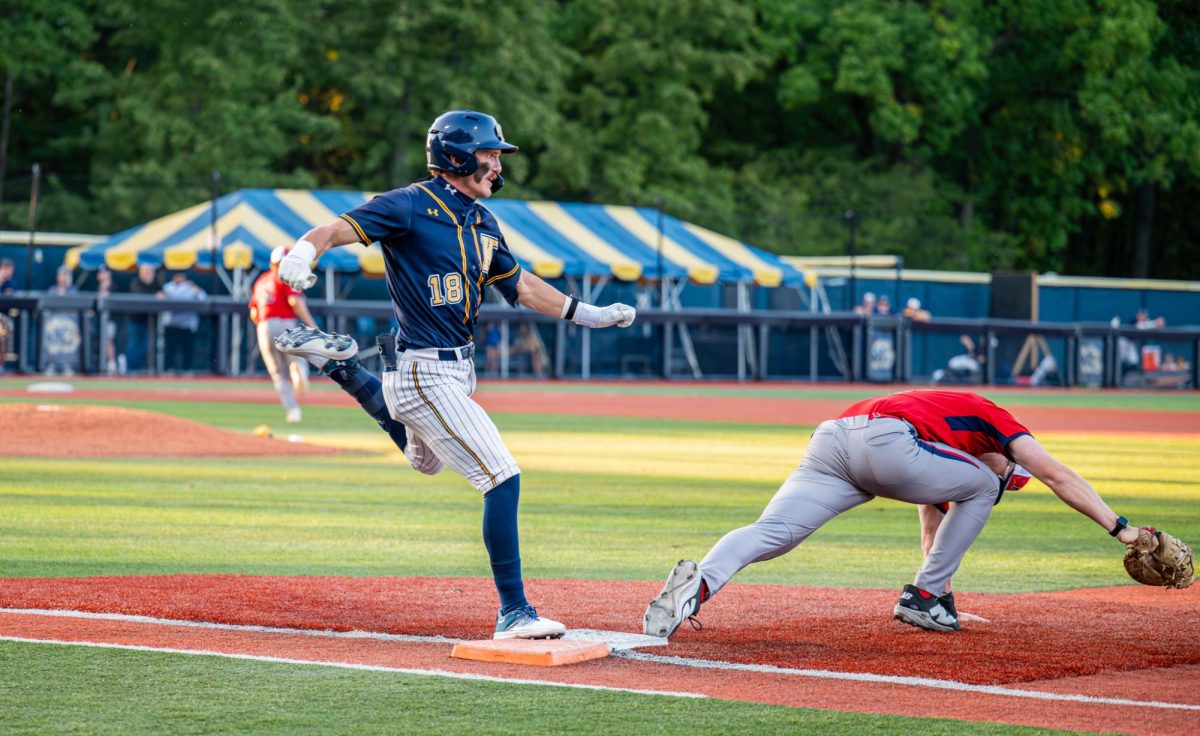 Kent senior Matt Thompson stretches to try and beat the play at first in the bottom of the second against Malone on Sept. 26, 2025.