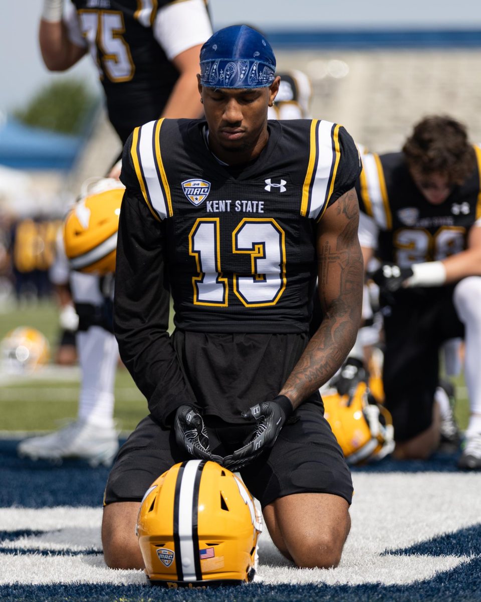 Redshirt sophomore and wide receiver Ardell Banks prays in the end zone before Kent State’s game against Buffalo on Sept. 13, 2025.