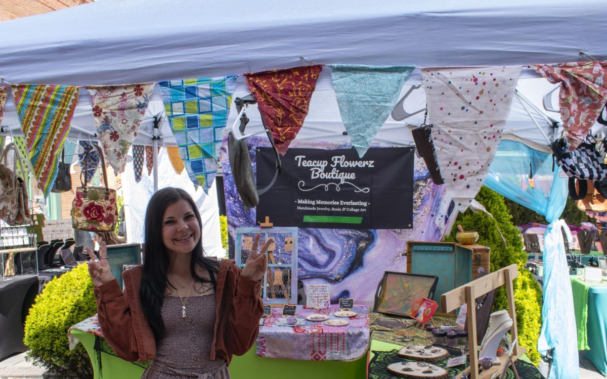 Owner of Teacup Flowerz Boutique, Ella Snyder, sells her crystal jewelry, recycled clothing and collage art at Hippie Fox Rocks’ Gem Show on Sept. 27, 2025.
