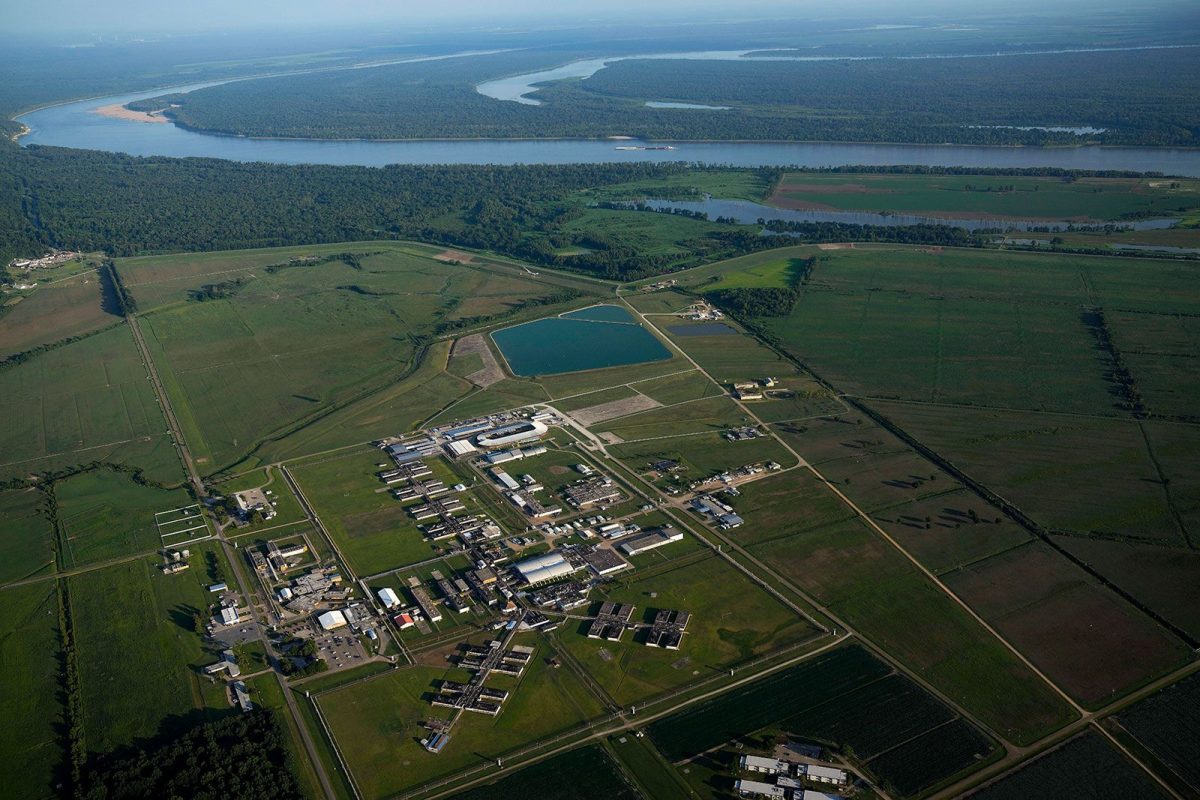 In this aerial photo, the Louisiana State Penitentiary lies along the bending Mississippi River, in July 2023, in Angola, Louisiana. The former 19th-century antebellum plantation once was owned by one of the largest slave traders in the US. It spans 18,000 acres – an area bigger than the island of Manhattan – and has its own ZIP code.