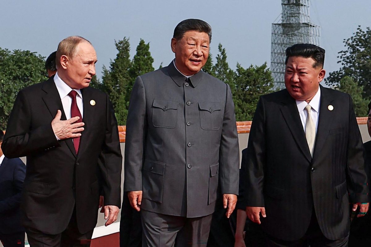 Russia's President Vladimir Putin walks with Chinese leader Xi Jinping and North Korea's leader Kim Jong Un before a military parade marking the 80th anniversary of the end of World War II in Beijing on September 3.