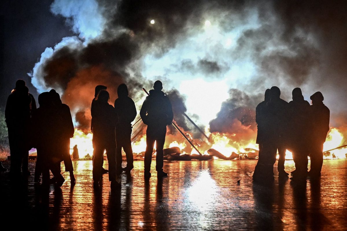 Protesters set up a fire to block the Cadix viaduct during a demonstration in Caen, northwestern France, on September 10.