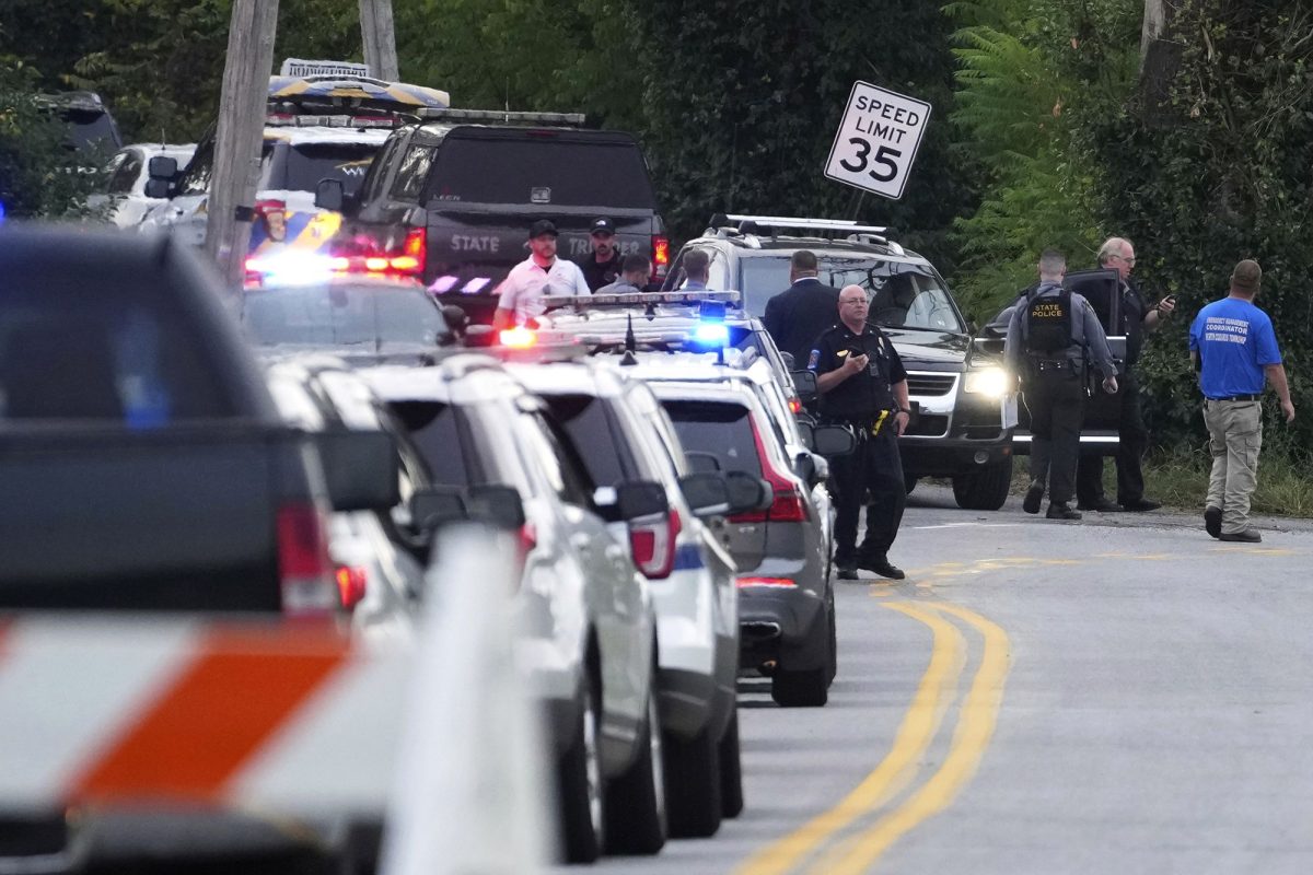 A long line of law enforcement vehicles are staged on the scene in North Codorus, Pennsylvania, where five people were shot.