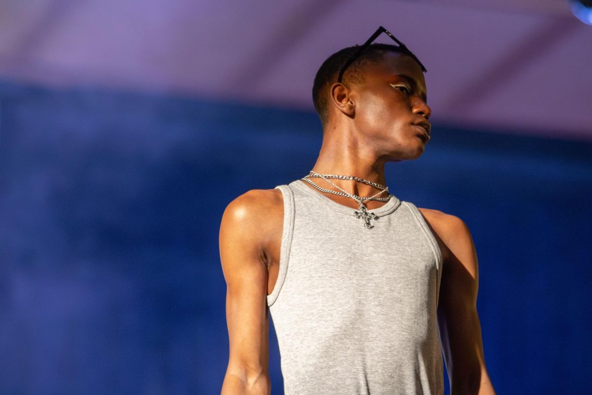 Model Nilo Murphy wears designer Richi Bestini's look on the runway during the Modista X Phi Delta Epsilon Fashion Show on Saturday, Oct. 18, 2025.