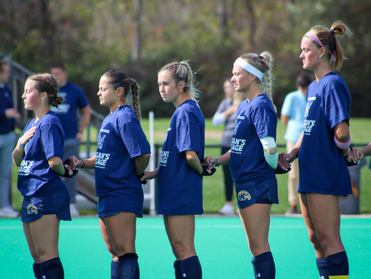 Kent State Golden Flashes join hands for the National Anthem during the field hockey match against Ohio University at Murphey-Mellis Field on Friday, Oct. 17.