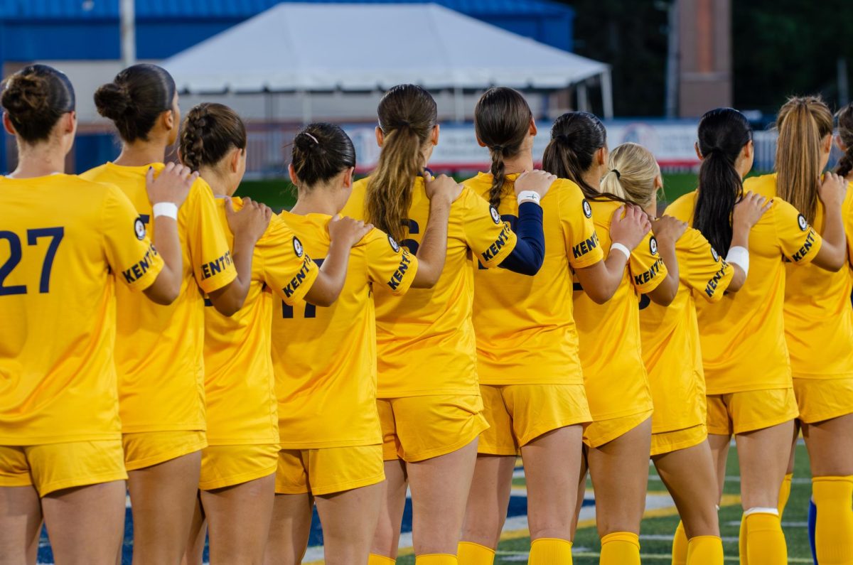 Kent players line up for national anthem against Ohio on Thursday, Oct.9, 2025