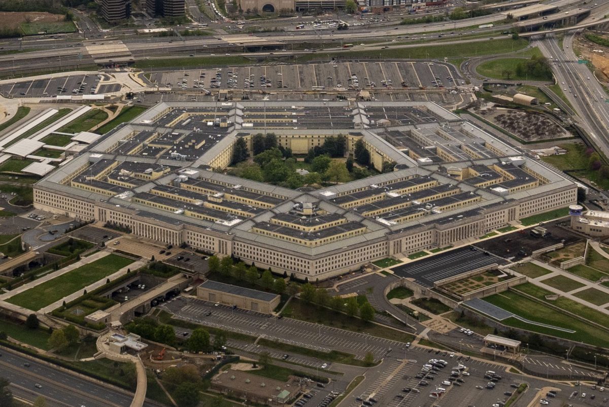 The Pentagon is seen from above in Arlington, Virginia. The Pentagon is telling beat reporters to sign restrictive new rules by Tuesday or surrender their press passes by Wednesday.