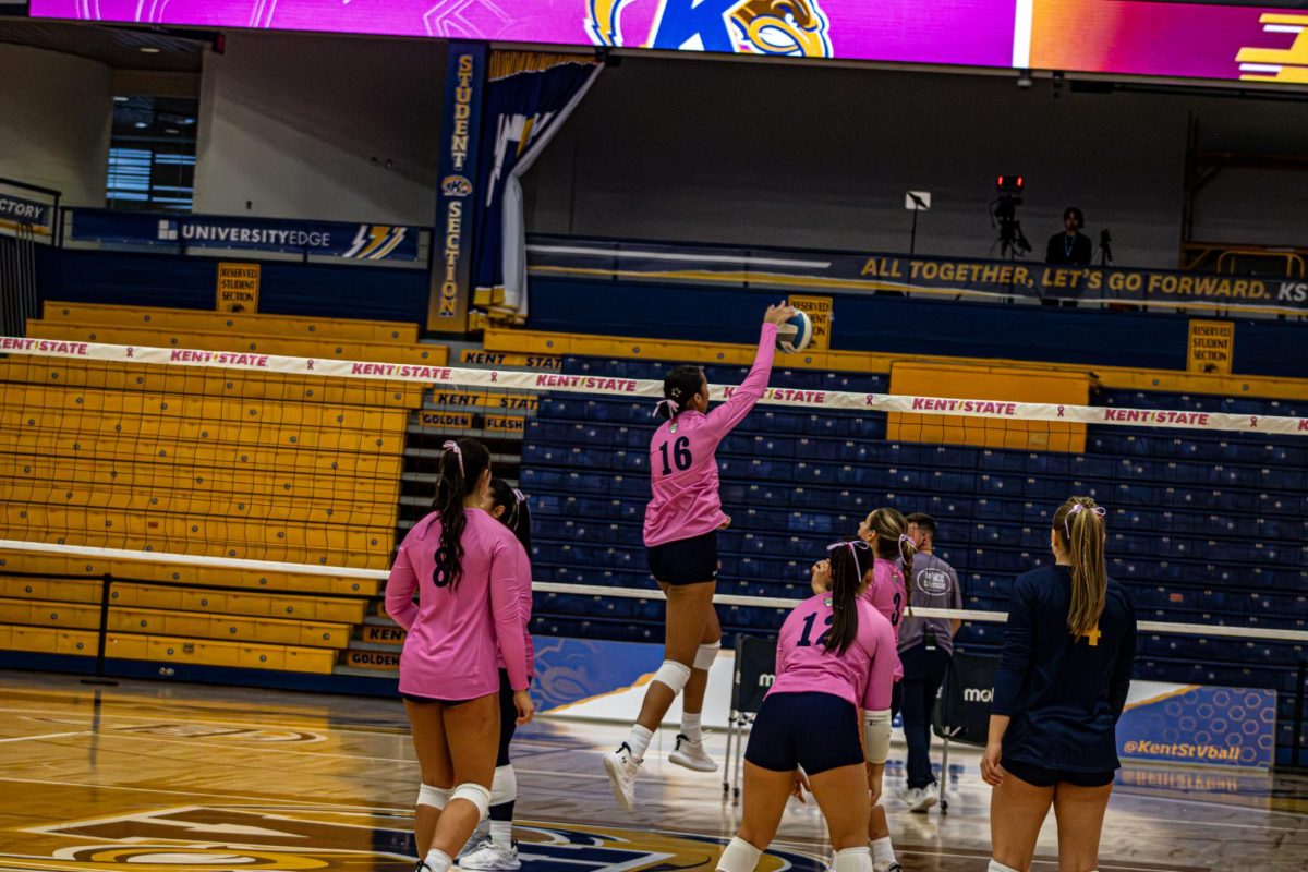 Number 16, Adalynn Ginley goes for a spike in practice run before taking on Central Michigan Chippewas Oct. 24, 2025