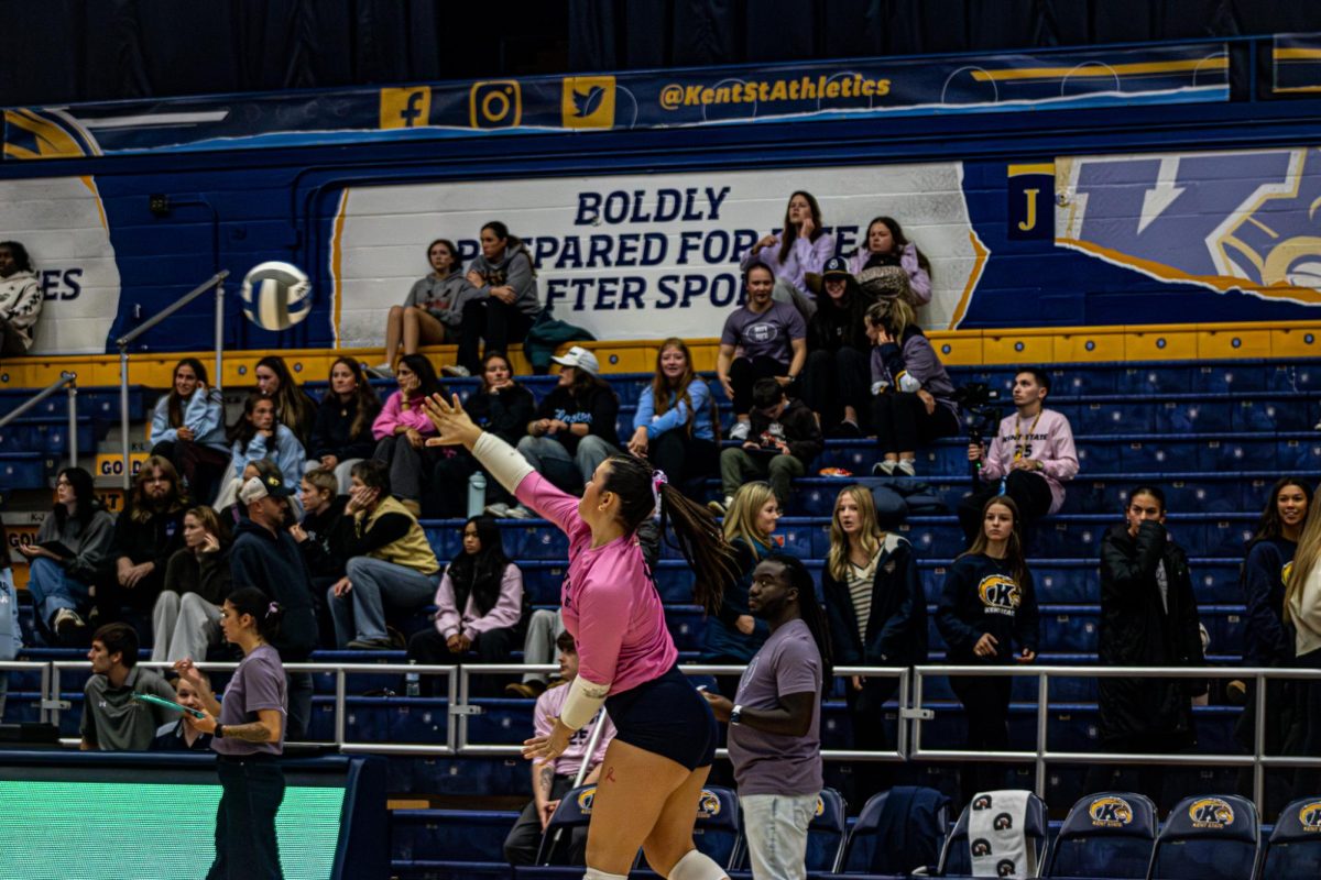 Number 12, Catie Patterson serves in volleyball game against Central Michigan Chippewas Oct. 24, 2025