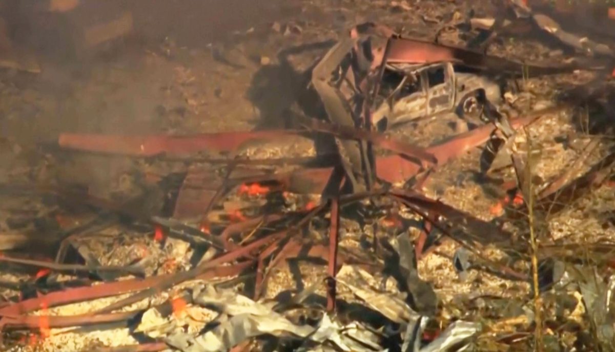 Debris covers the ground and vehicles after a powerful blast ripped through a military explosives manufacturing plant in Hickman County, Tennessee, on October 10.