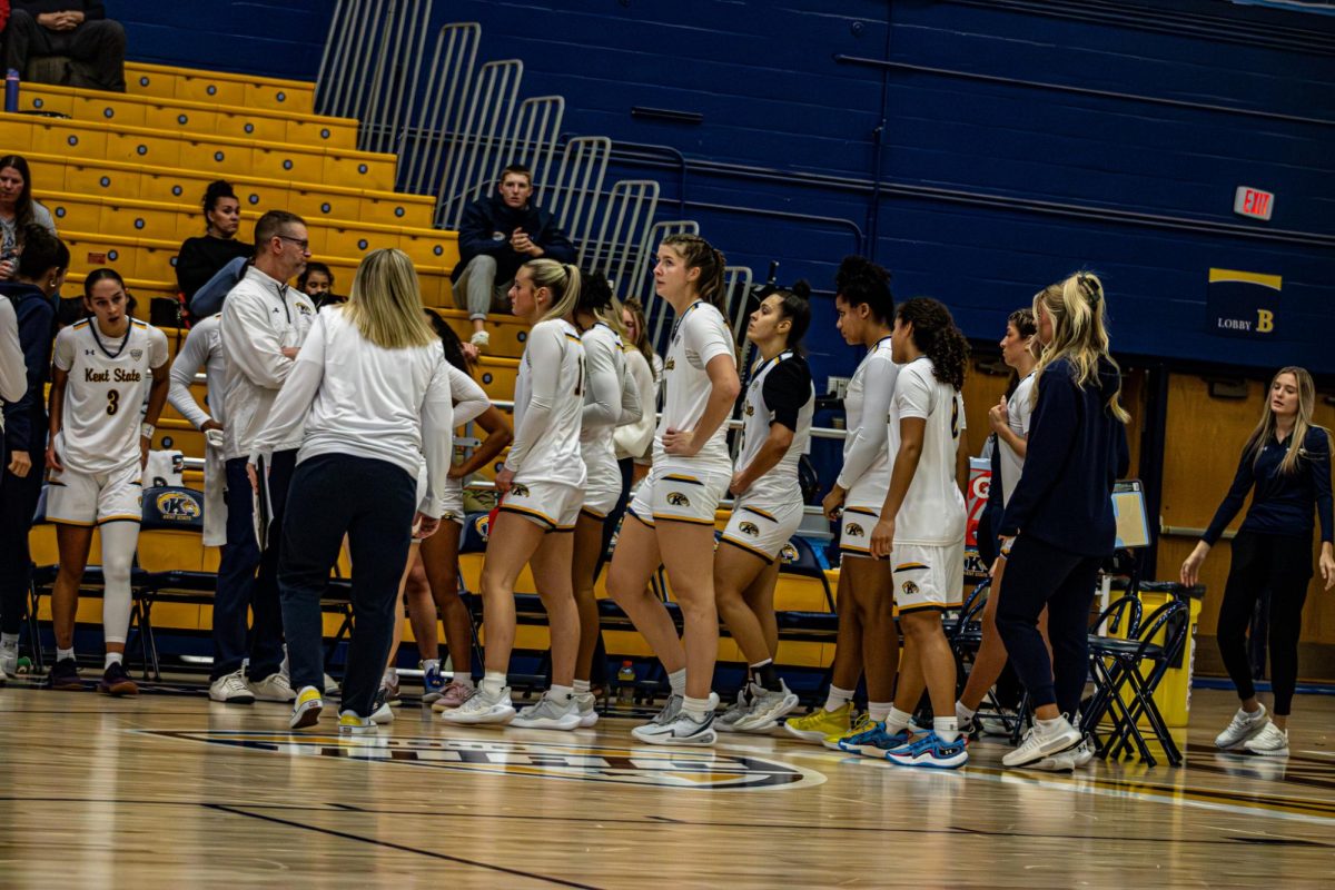 Woman's basketball team waits as Walsh calls for a time out in the second quarter. Nov. 11, 2025