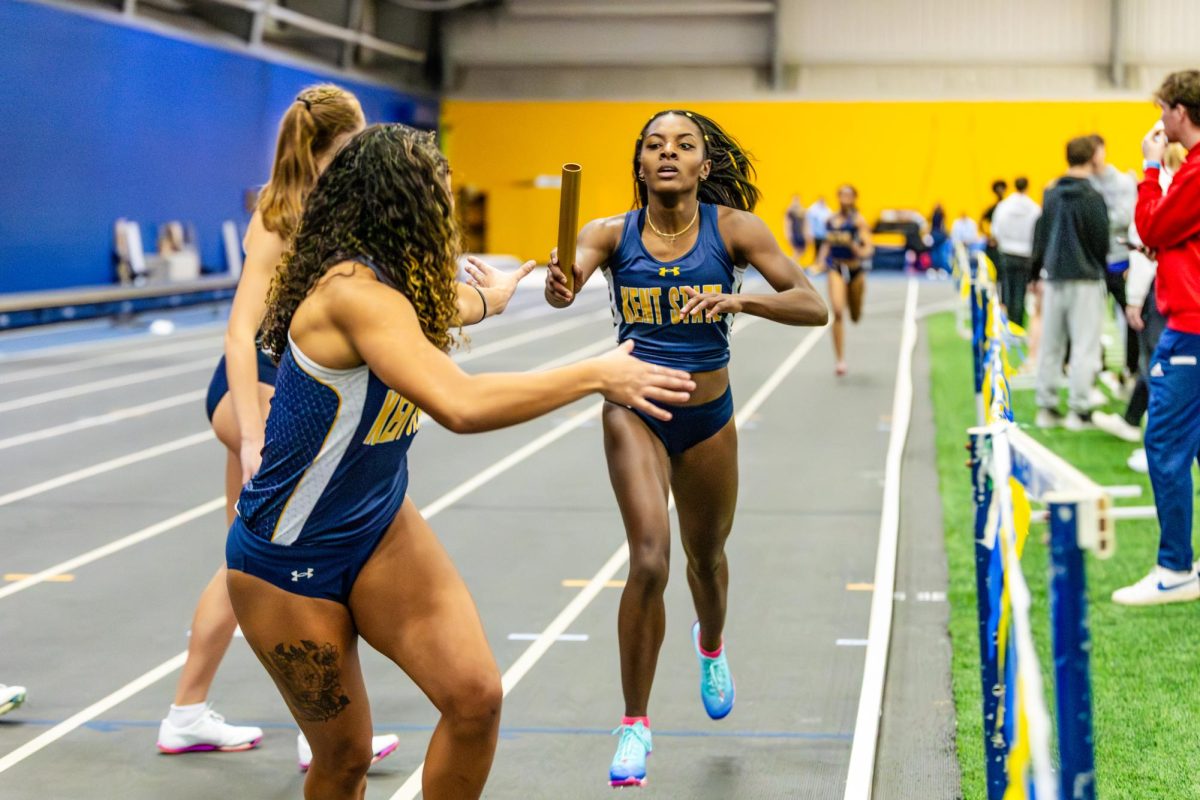 Kent redshirt junior Marinna Atanmo hands off the baton to Kent junior Amryne Chilton during the women's 4x4 relay finals at the Jud Logan Memorial meet on Friday Jan. 23. 2026.